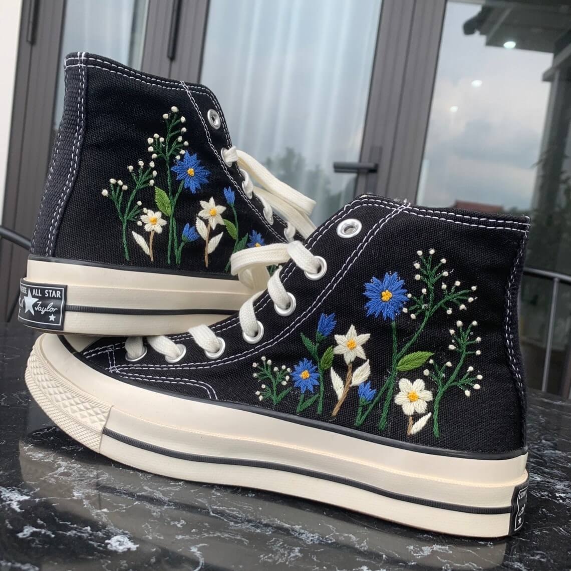 a4 Converse Embroidered Floral Blue White Chrysanthemums carries the meaning of freedom
