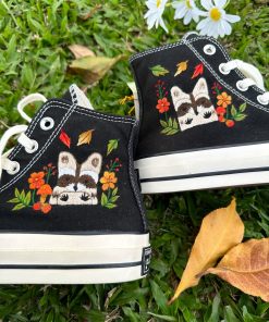 a4 Converse embroidered raccoons are super cute in the middle of a colorful flower garden.