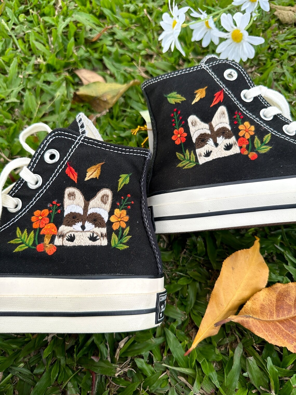 85.2 a4 Converse embroidered raccoons are super cute in the middle of a colorful flower garden.