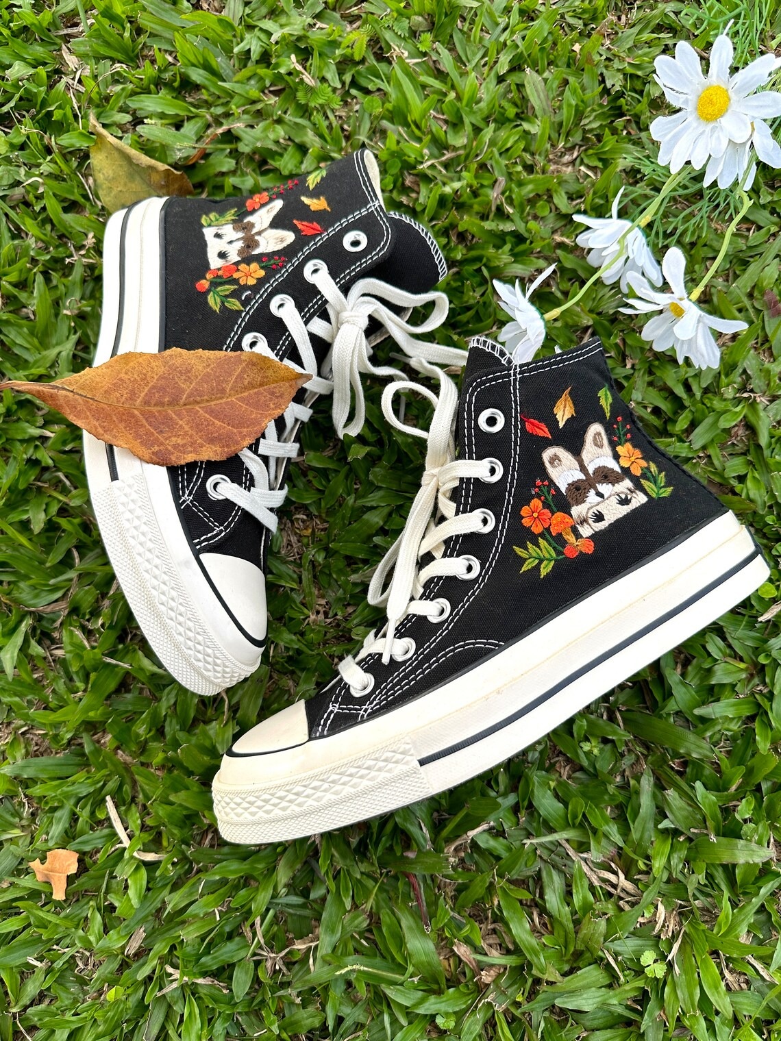 85.4 a2 Converse embroidered raccoons are super cute in the middle of a colorful flower garden.