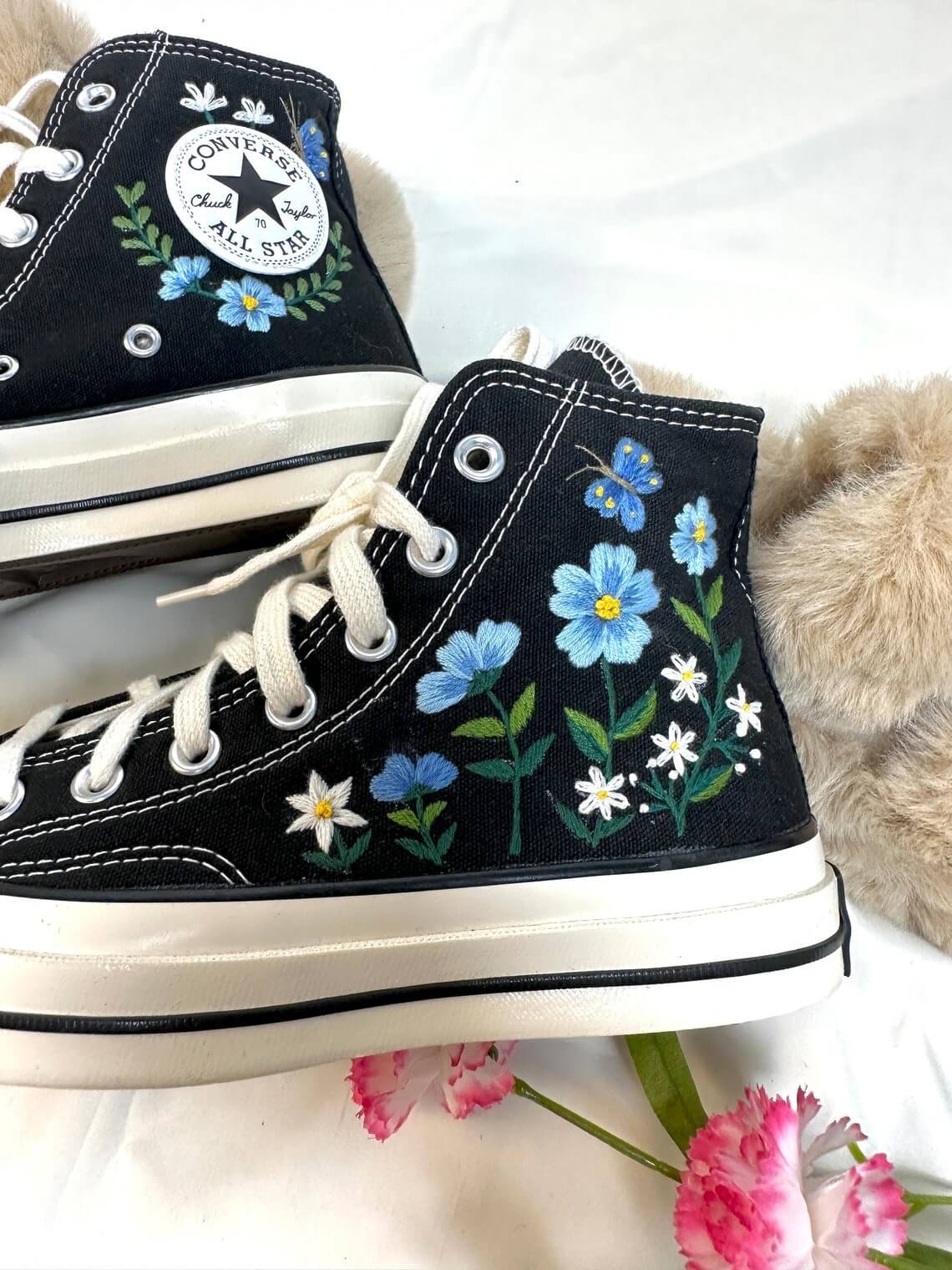 86.6 a5. Converse embroidered high tops with blue flowers and monarch butterflies